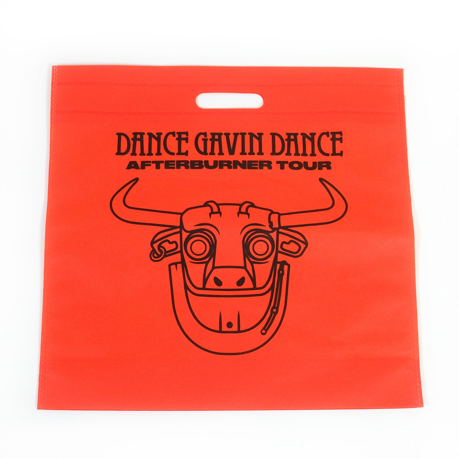 image if an orange canvas tote bag  on a white background. fell size bkack print of a robot bull's head. at the top says dance gavin dance afterburner tour