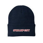 image of a navy winter beanie hat with swanfest embroidered on the cuff in red with a white outline.