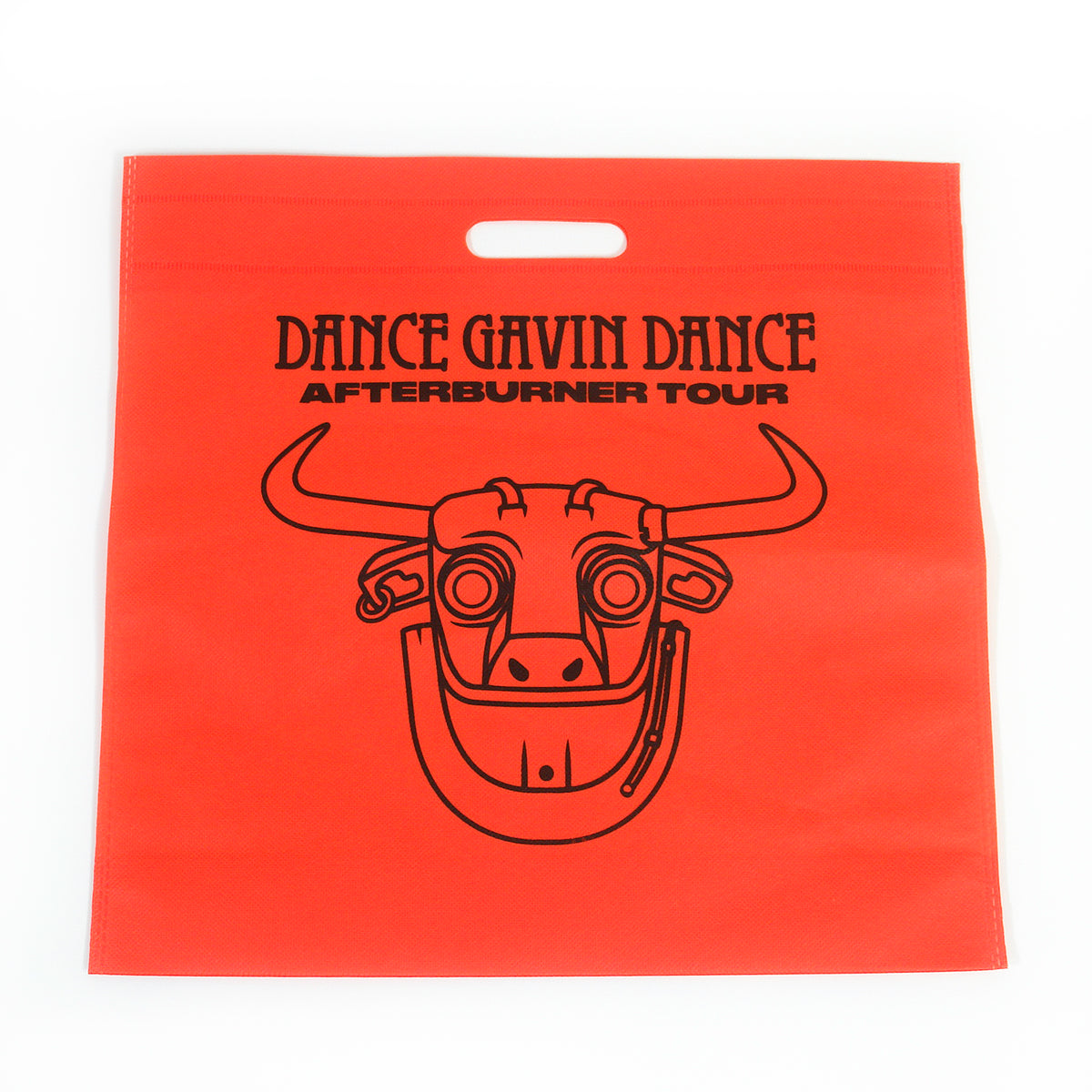 image if an orange canvas tote bag  on a white background. fell size bkack print of a robot bull's head. at the top says dance gavin dance afterburner tour