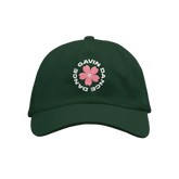 A forest green dad hat with a cherry blossom design and the text 'DANCE GAVIN DANCE' embroidered on the front.