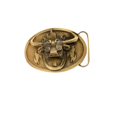 A bronze finish belt buckle with a design resembling a stylized bull's head