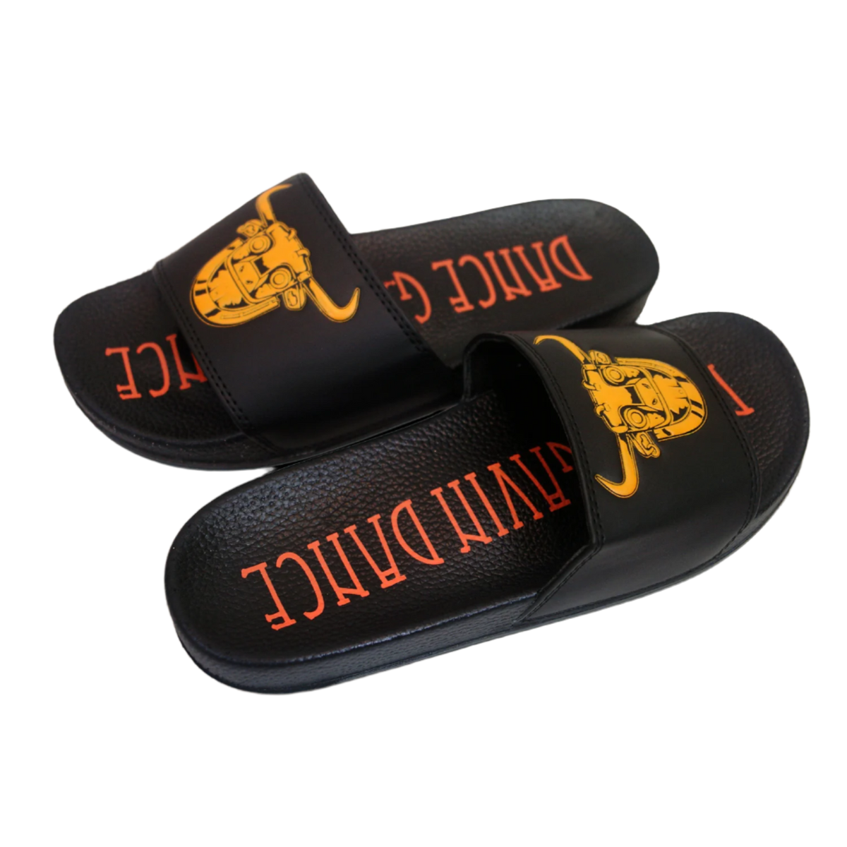 A pair of black slip-on slides with the Dance Gavin Dance logo printed on the sole and the image of a character's head printed on the top.