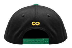 Black baseball cap shown from the back, featuring a yellow embroidered infinity symbol on the center, a green snapback strap, and a green button on top.