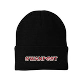 image of a black winter beanie hat with swanfest embroidered on the cuff in red with a white outline.